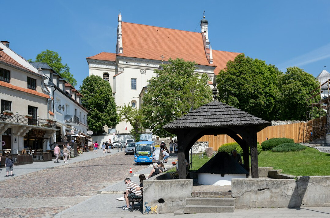 Local community festival with people gathered in a small Polish town square