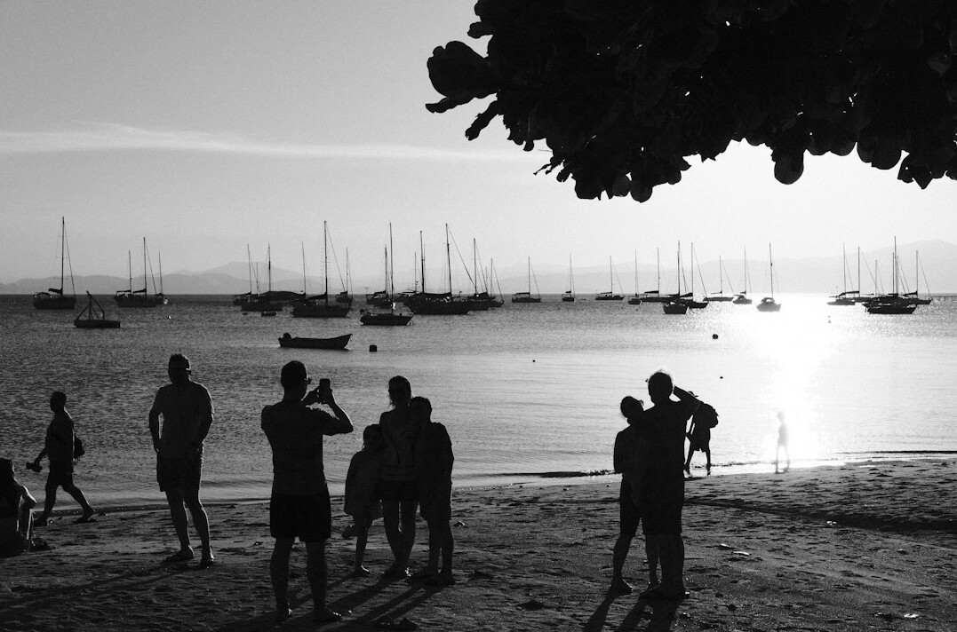 Group of people learning photography during an outdoor workshop